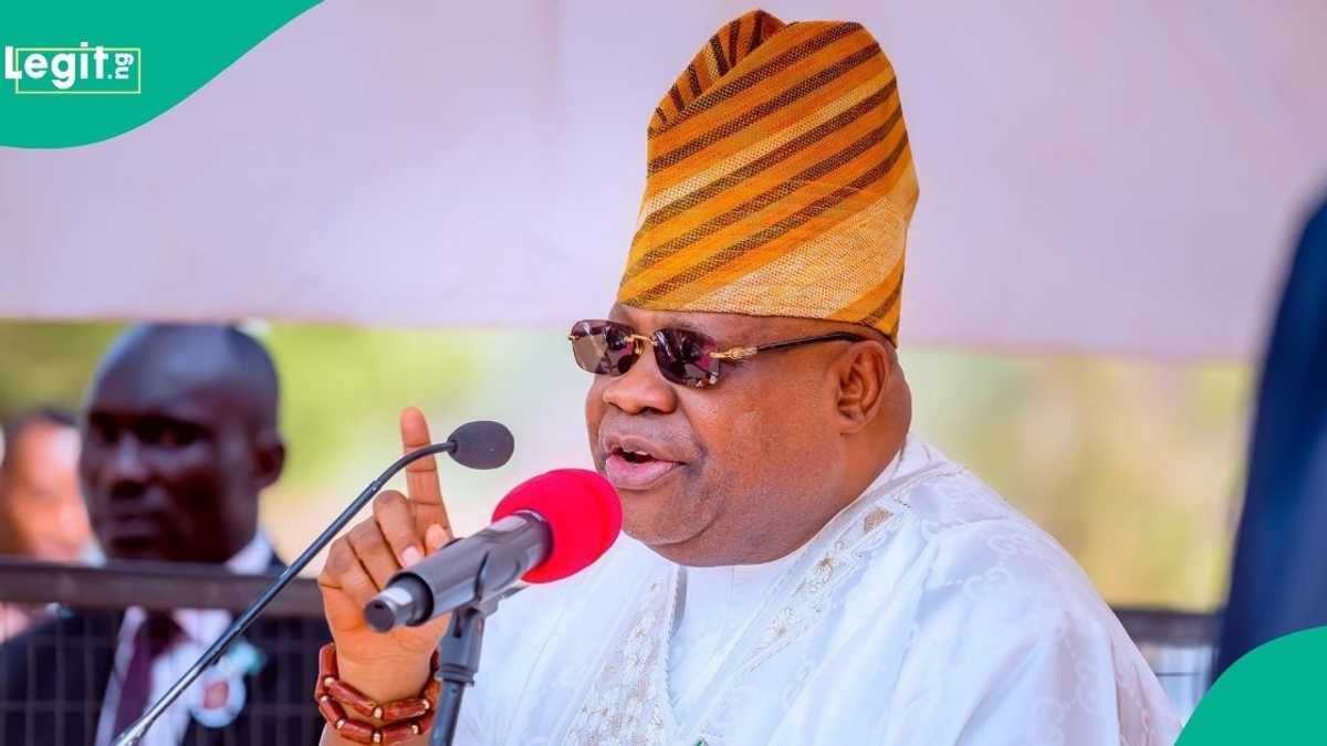 Osun State Governor Ademola Adeleke speaking at a podium during a political event, denying ADC electoral deal allegations