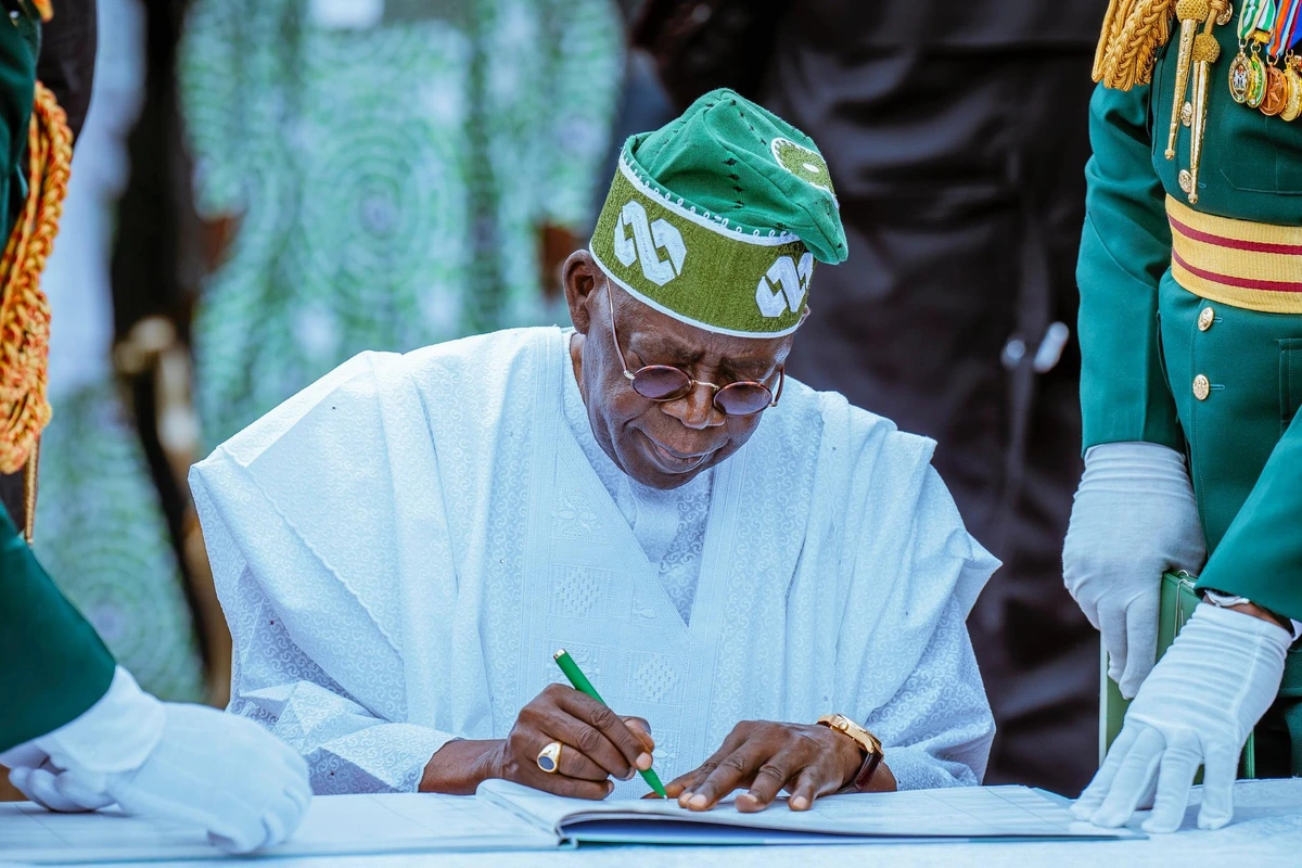 Nigerian and Burkinabe flags side by side in a diplomatic setting