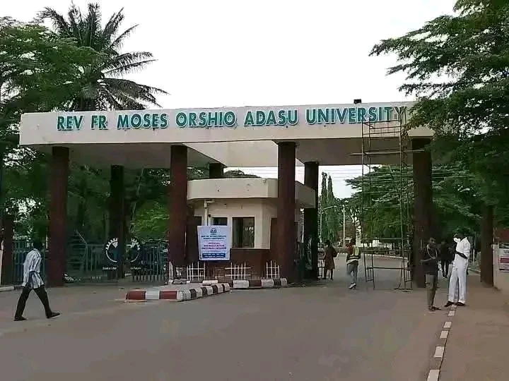A university campus courtyard in Benue State showing modern buildings and a lone security officer, reflecting the setting of the reported campus violence incident.