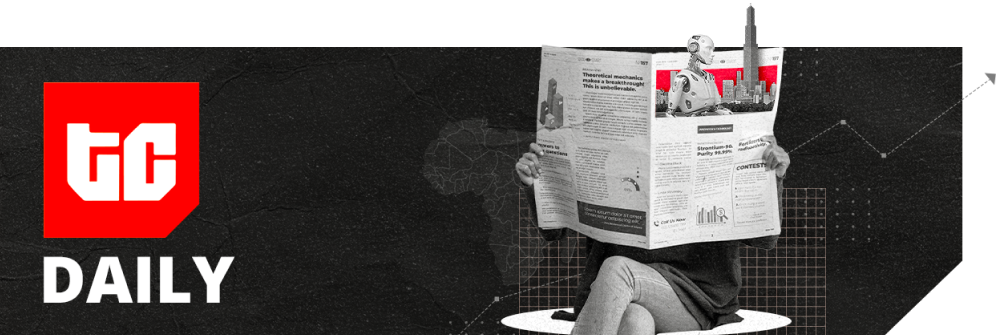 A modern Lagos newsroom desk with screens showing TechCabal Daily headlines and fintech data, representing Nigeria’s tech and business news landscape.