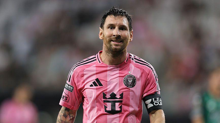 Inter Miami fans celebrating as Messi scores a crucial free kick in a heated MLS match against San Diego