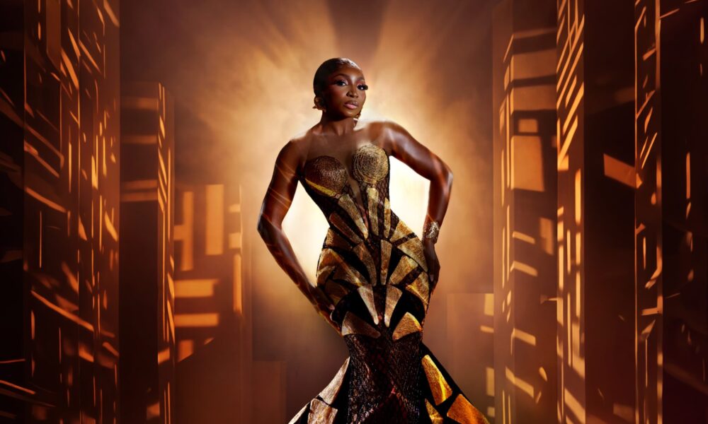 Omowunmi Dada gold and black sculpted gown on a mannequin, showcasing African couture at TIFF 2026.