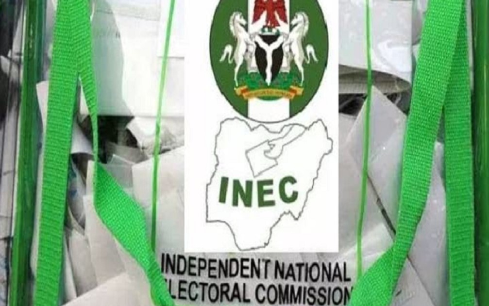 INEC office showing NIN integration tools and voter register documents