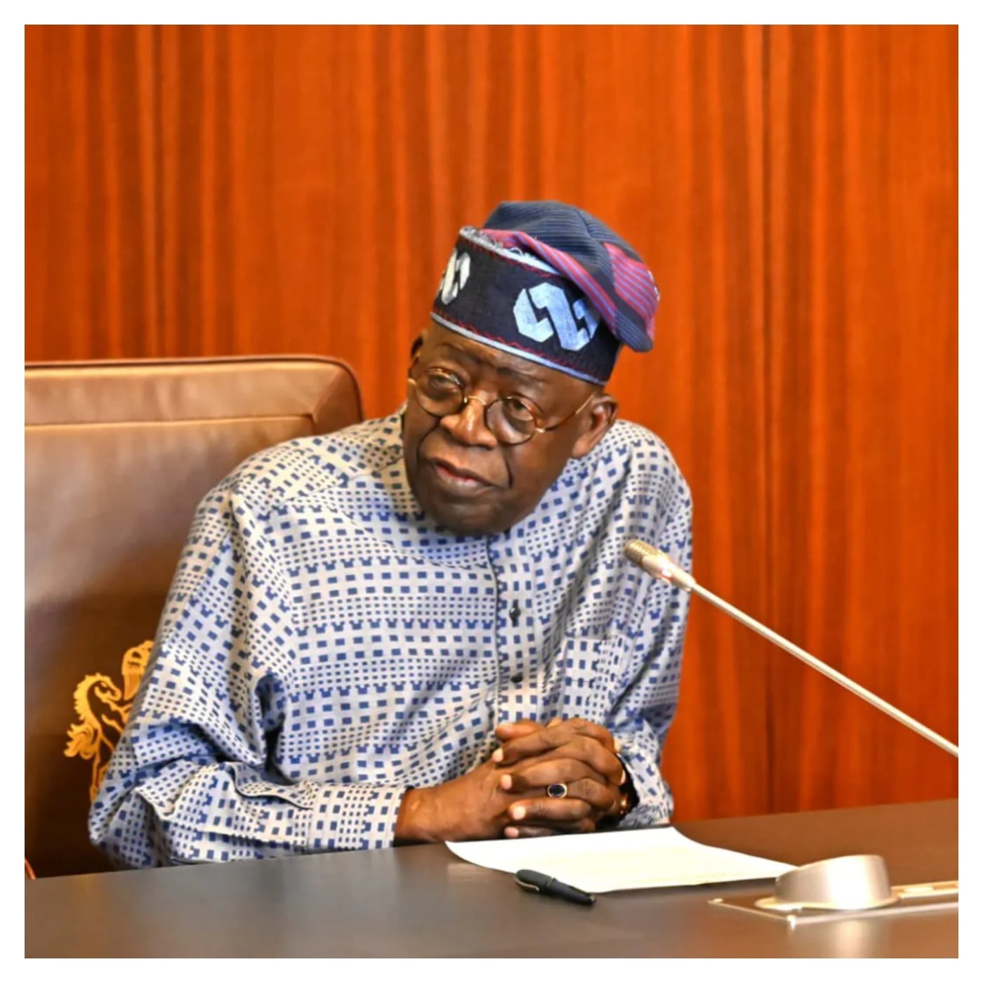Symbolic representation of Nigeria-US diplomatic tension with presidential and FBI imagery