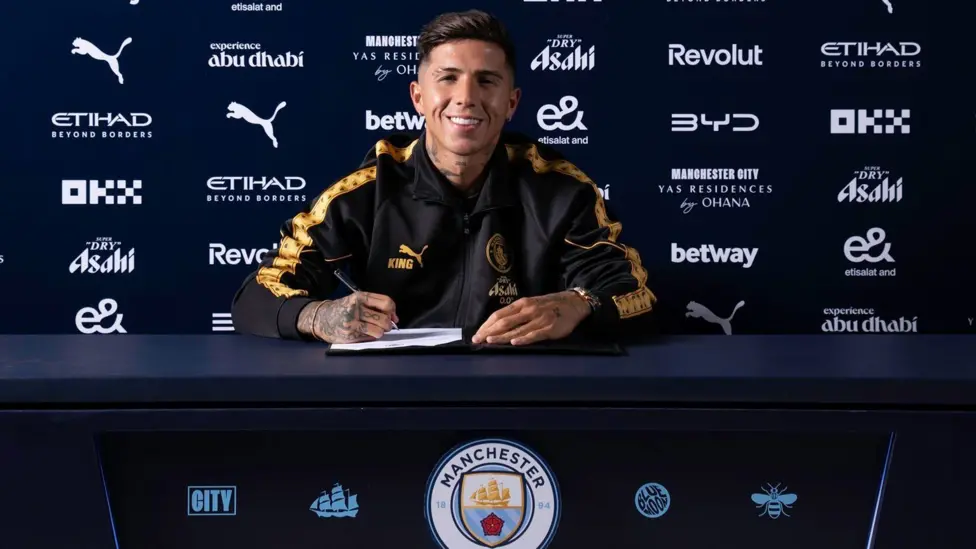 A Nigerian football jersey draped over a golden trophy, symbolizing the excitement of Premier League transfers in 2026.