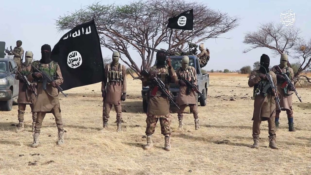 Military operations in Sambisa Forest with smoke rising from combat zones
