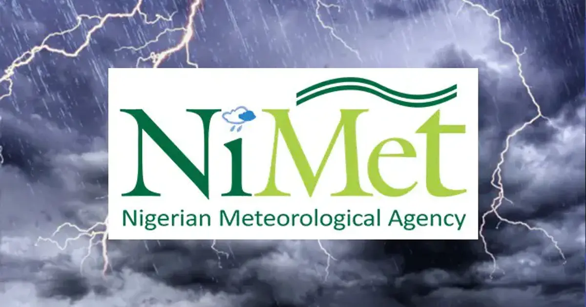 Dark thunderclouds gathering over a Nigerian landscape, indicating an approaching storm.
