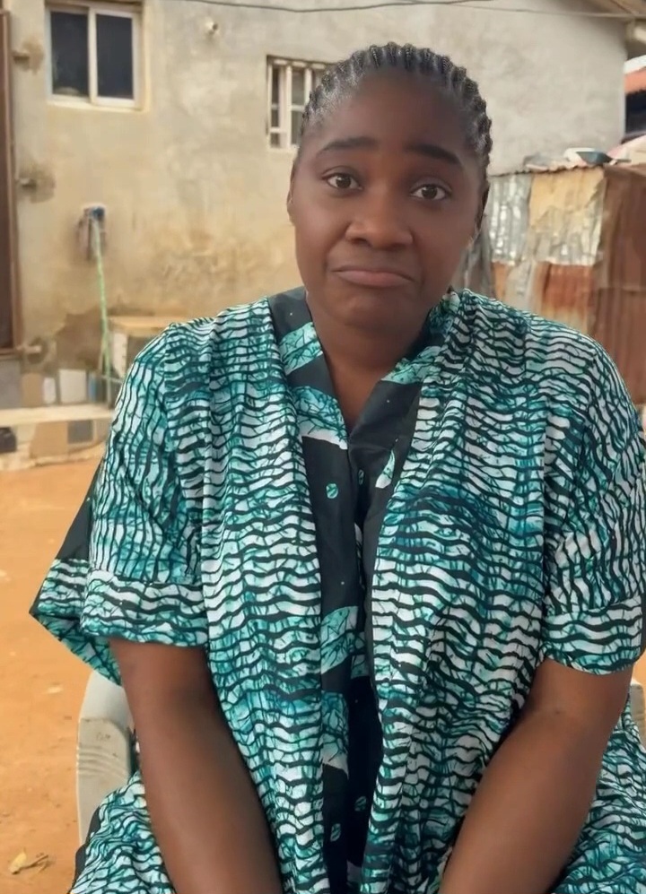 African woman offering relationship wisdom in traditional clothing