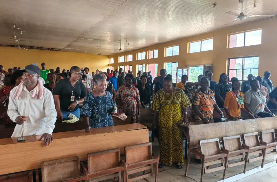 A Nigerian university campus with empty lecture halls and administrative buildings, reflecting the tension over workers' welfare and funding issues.