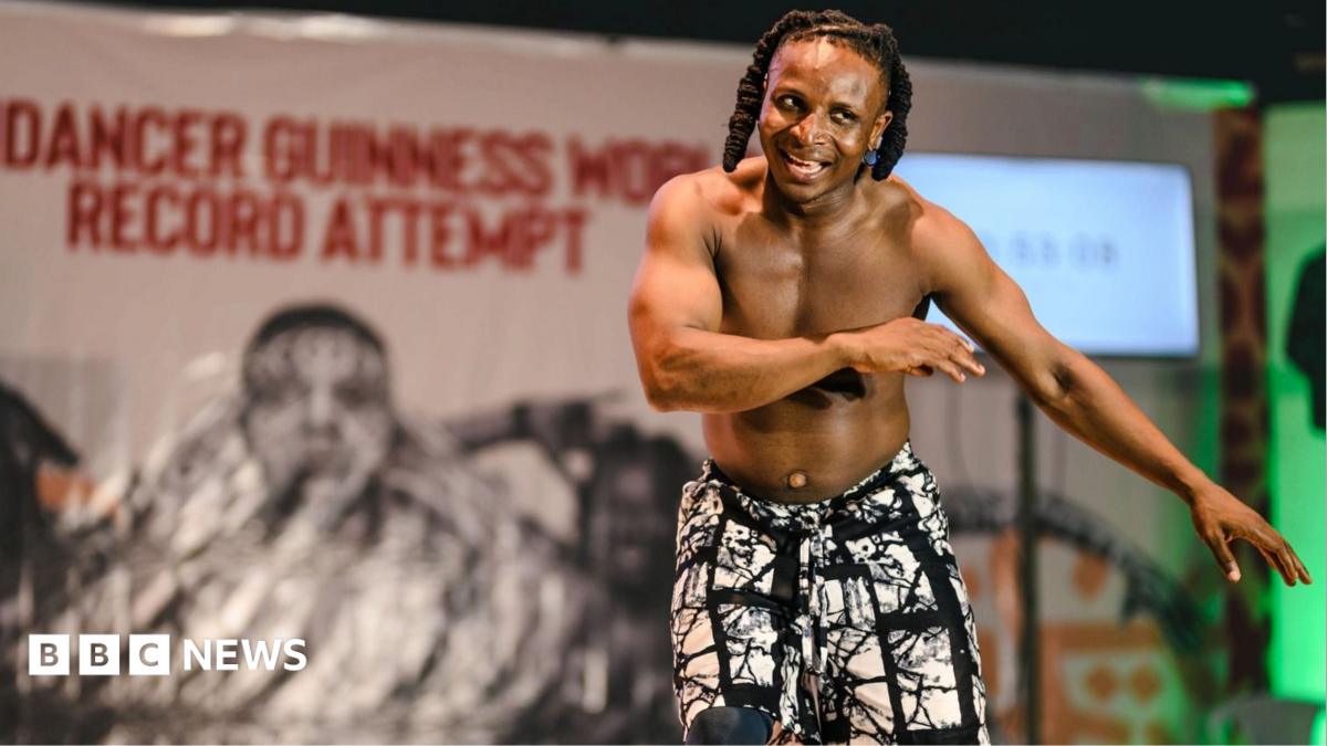 Dynamic scene of Nigerian dancers performing energetically in an urban backdrop, showcasing colorful traditional outfits and rhythmic movement.