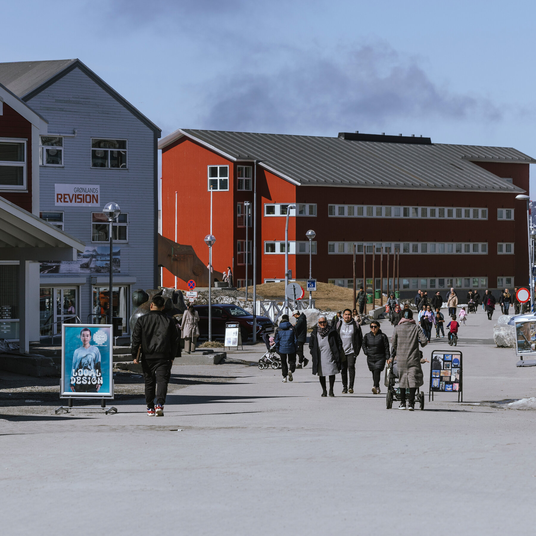 A breathtaking landscape of the Greenlandic arctic coastline featuring glaciers and icy waters.