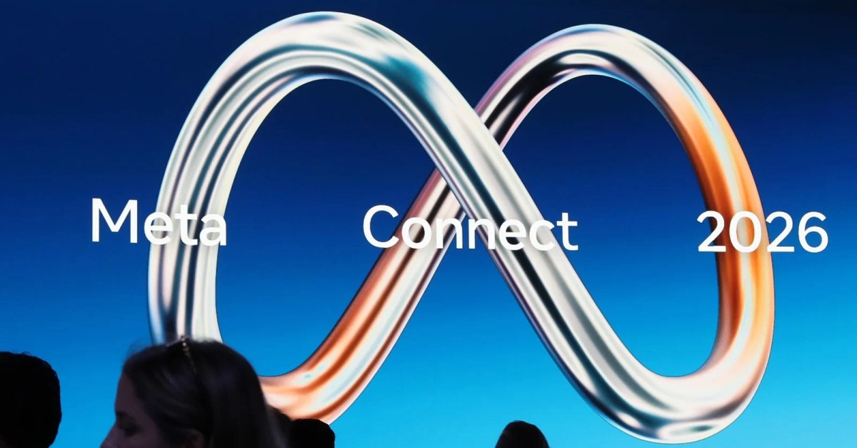 Wide-angle view of a tech conference stage during Meta Connect 2026, showing abstract blue light installations and futuristic digital interface visuals against a sleek backdrop.