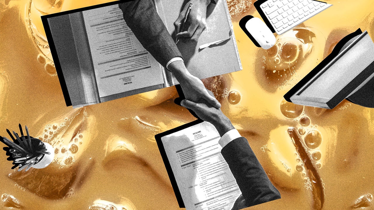 Iced coffee cup on a glass desk in a contemporary office reception