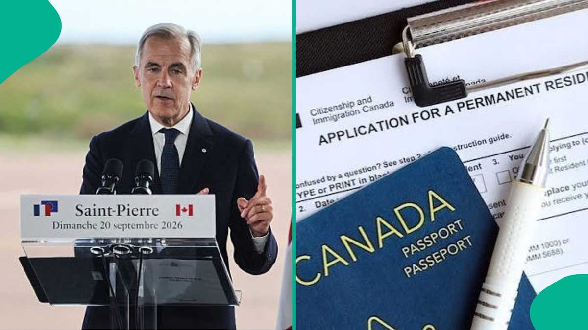 Canadian passport and laptop on desk with Nigerian flag, symbolising migration considerations.