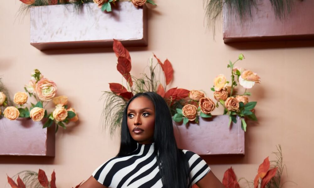 Stylish African woman in modern Lagos fashion under sunset
