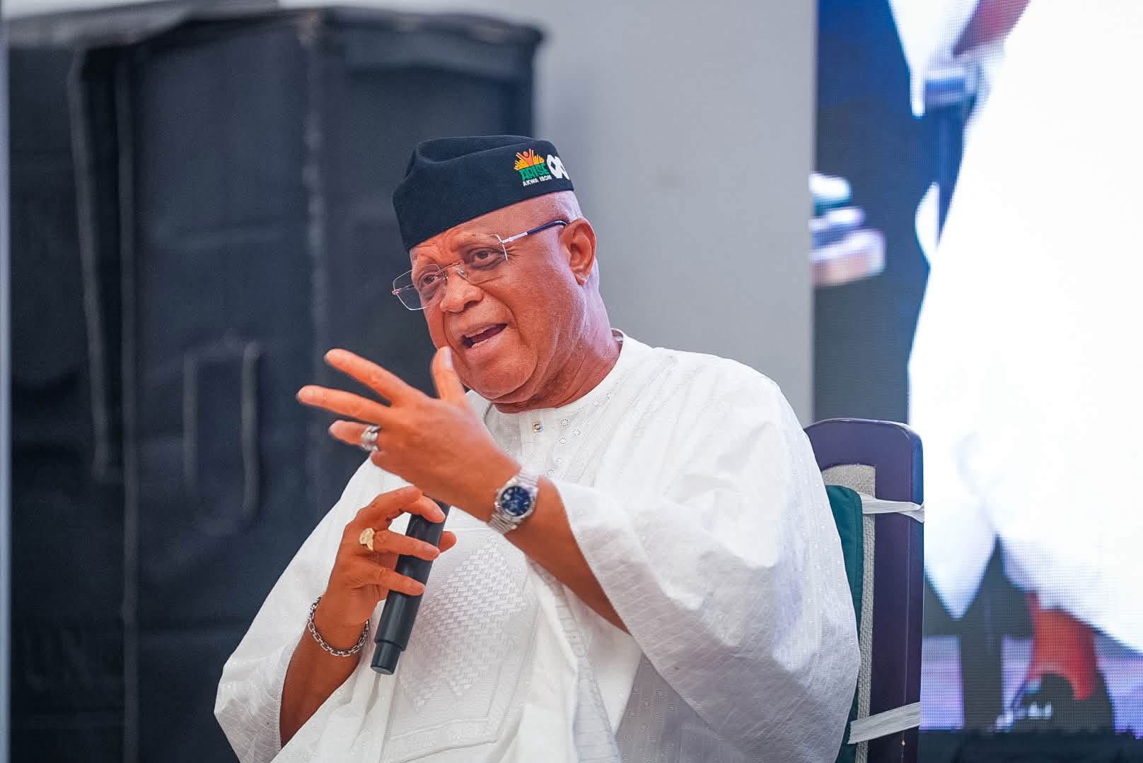 Teachers in a Nigerian classroom wearing smart attire after receiving a wardrobe allowance.