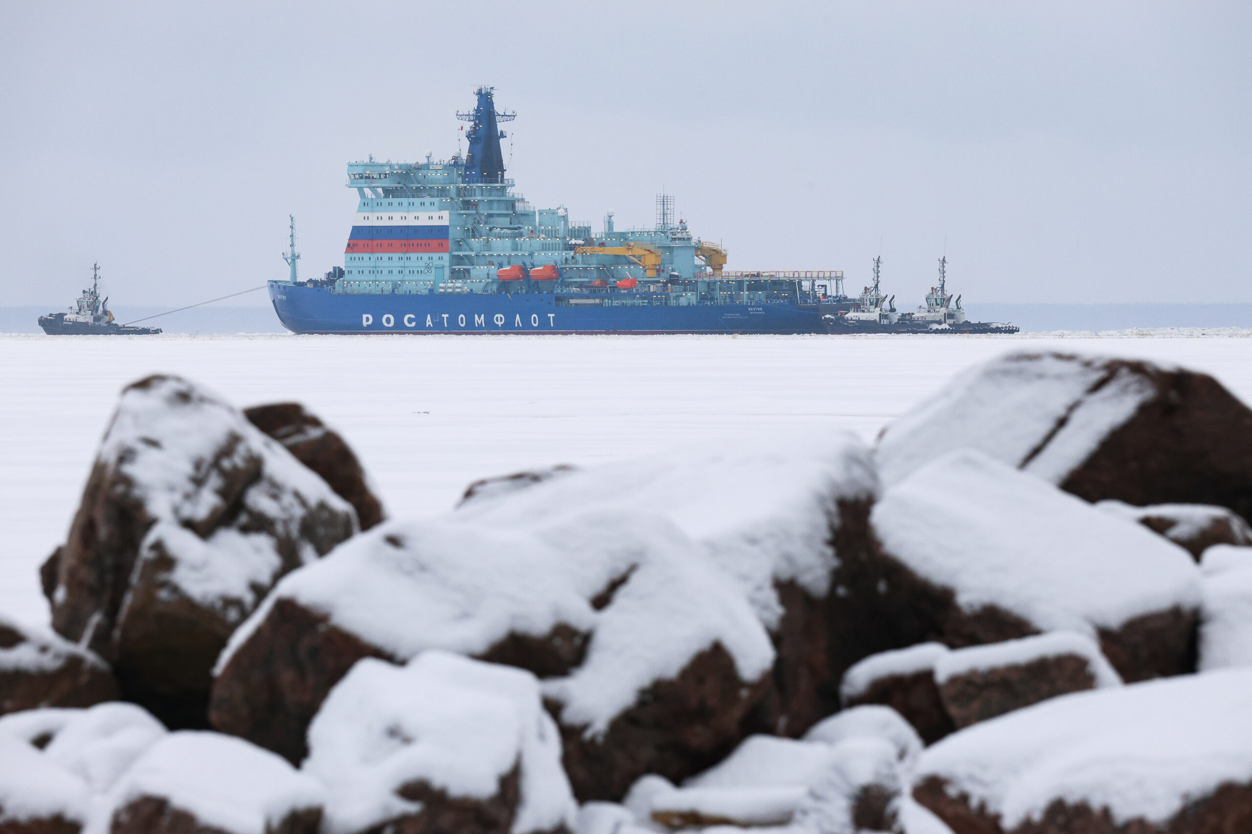 Cargo ship on Arctic waters with a map linking African ports to the Northern Sea Route
