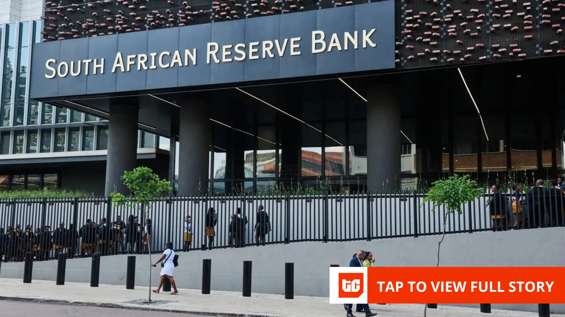 African city skyline with digital payment terminals illustrating fintech growth