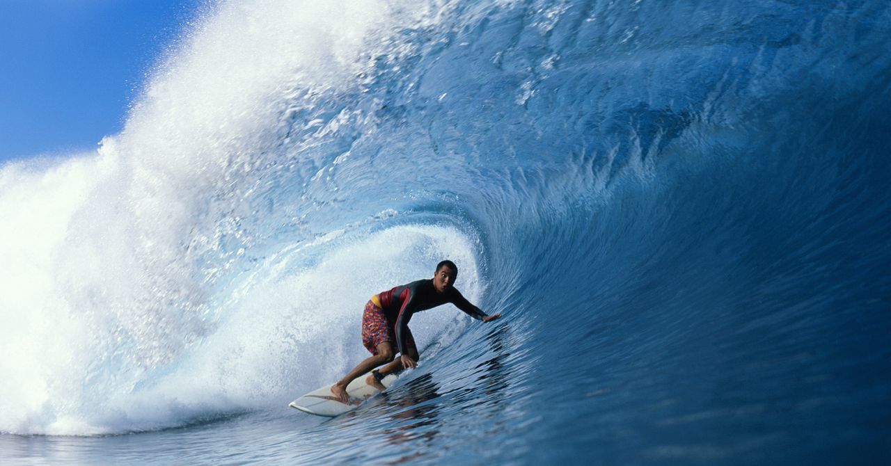 Sunrise over a world‑renowned surf break showing changing shoreline and rolling waves