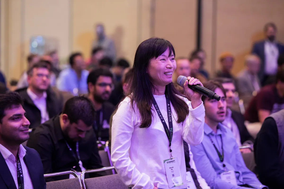 Founders networking at TechCrunch Disrupt 2026 conference venue