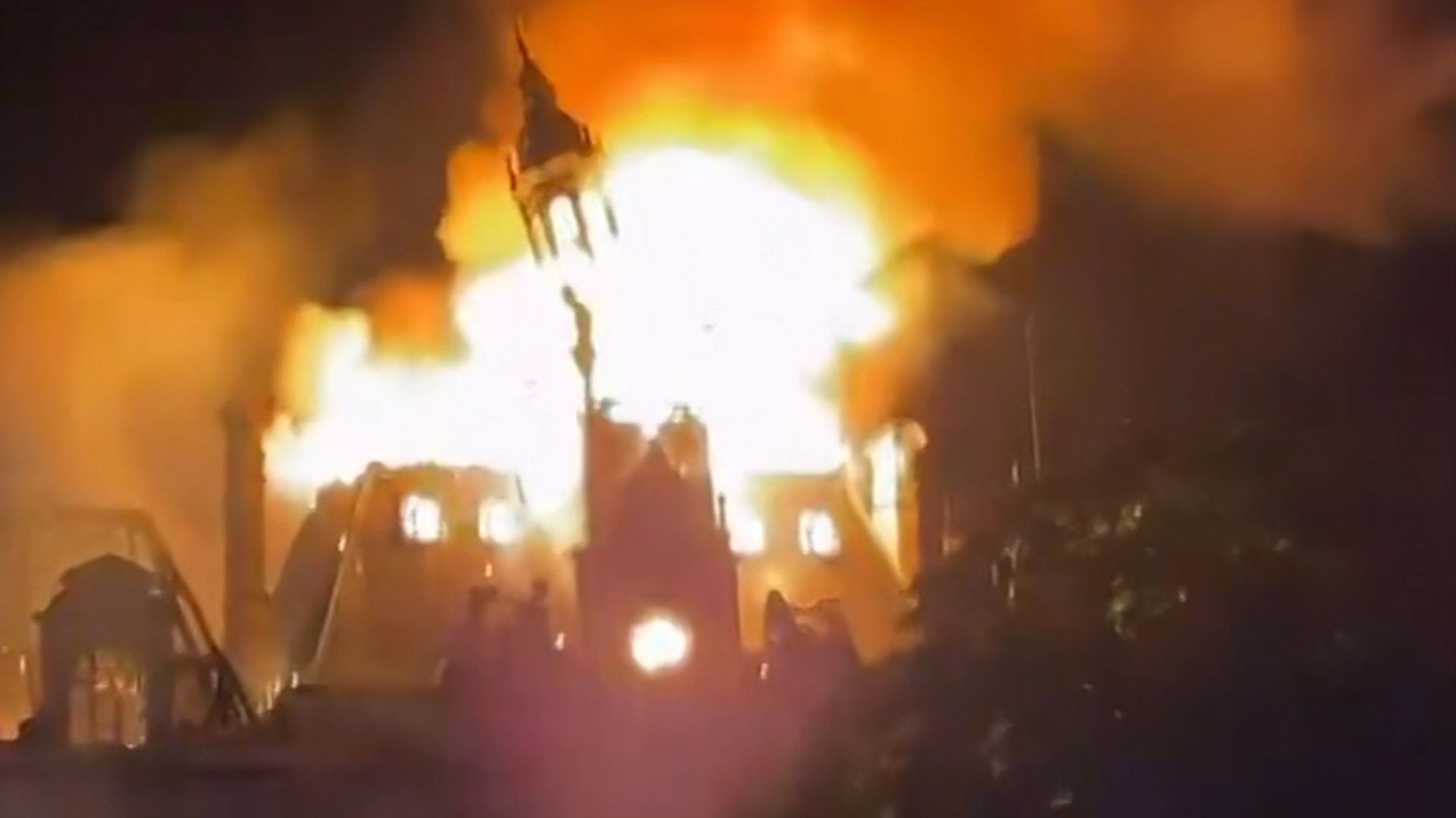 Limoges city hall building with smoke and emergency lights after fire