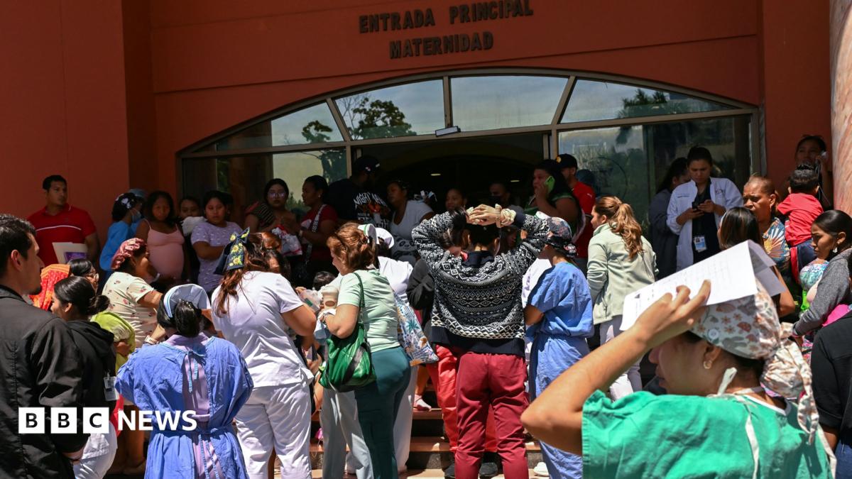 Severe building damage along Panama city coastline following magnitude 7.7 earthquake with cracked structures and debris