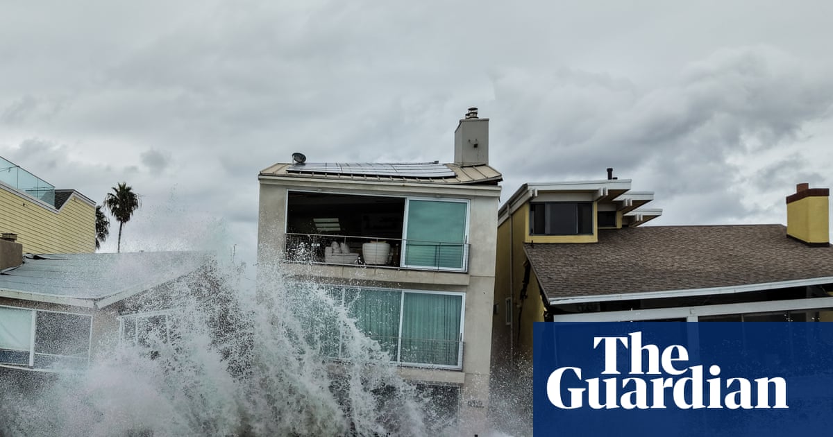 Damaged California boardwalk and flooded beachfront home after intense waves.