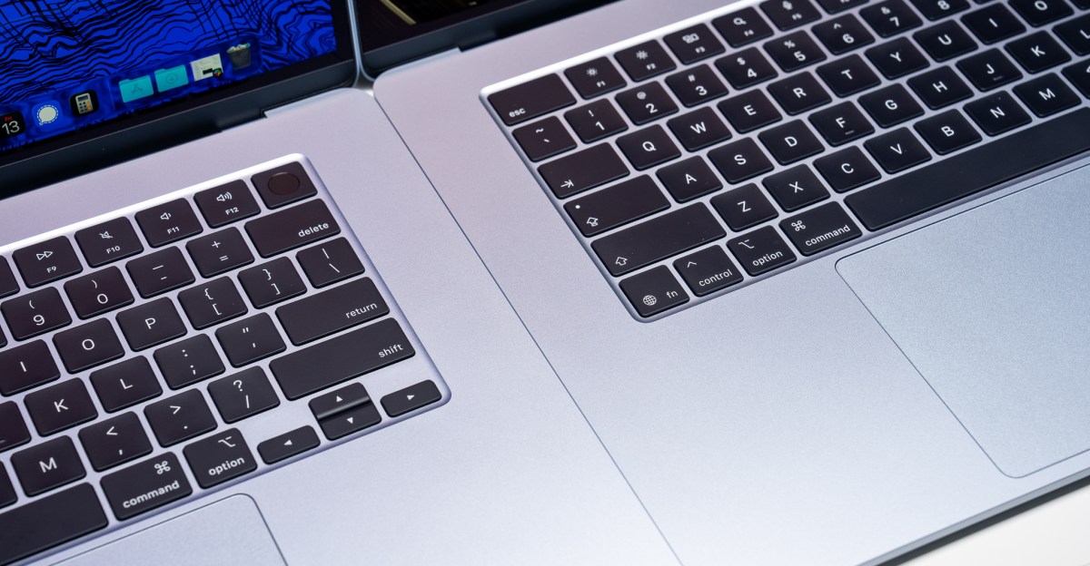 MacBook, iPad, and Apple Watch on a desk with autumn light